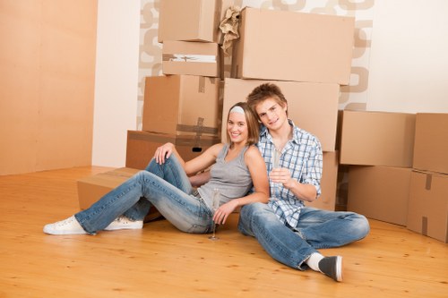 Packed moving boxes and furniture ready for transport