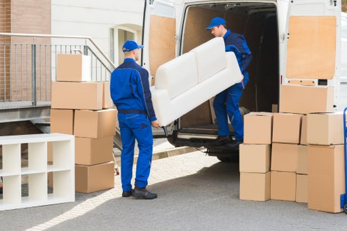 Moving van outside elegant Belgravia townhouse street