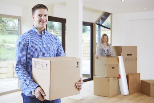 Professional movers loading boxes for a Belgravia move