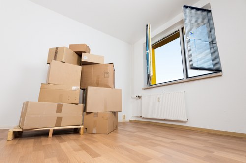 Boxes and furniture being unloaded at a Belgravia property