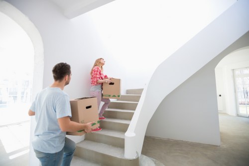 Professional removals team demonstrating safe and insured moving practices