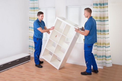 Movers navigating access challenges in a Belgravia property